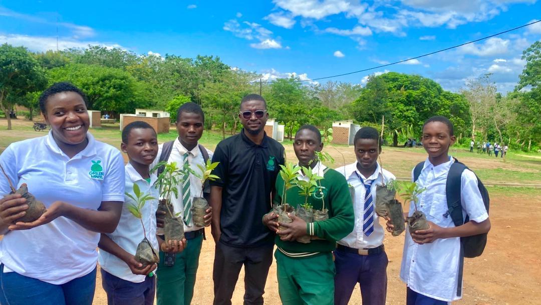 Learners and the Green Minds team ready to plant